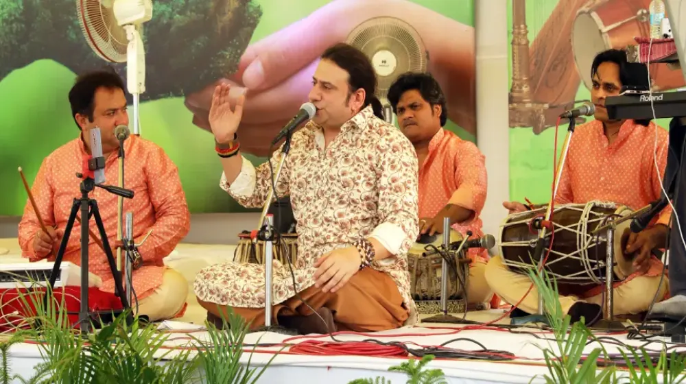 <p style="text-align: center;"><strong><span style="color: #7d4219; font-size: 20pt; font-family: 'book antiqua', palatino;">Devotional Songs</span></strong></p>